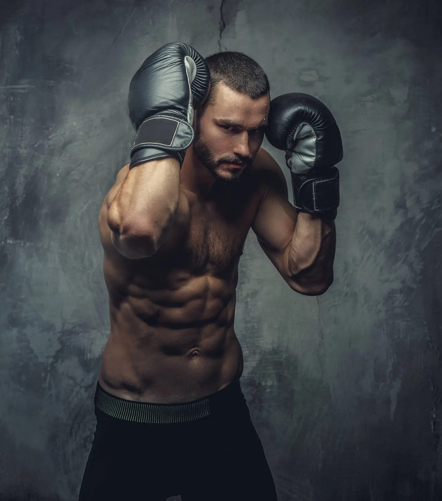 Boks eldivenleriyle sporcu